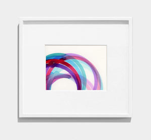 framed abstract painting of purple, pink, blue interlocking circles 
