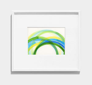 framed abstract painting of interlocking yellow, green, blue circles 